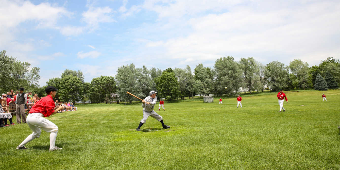 Teams play historic baseball at Living History Farms. Image courtesy of Living History Farms.