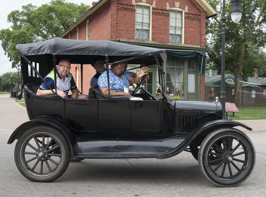 Teachers in the NEH-funded workshop take a ride in a Model T Ford. The workshop attracts educators from across the nation. Image courtesy of The Henry Ford.