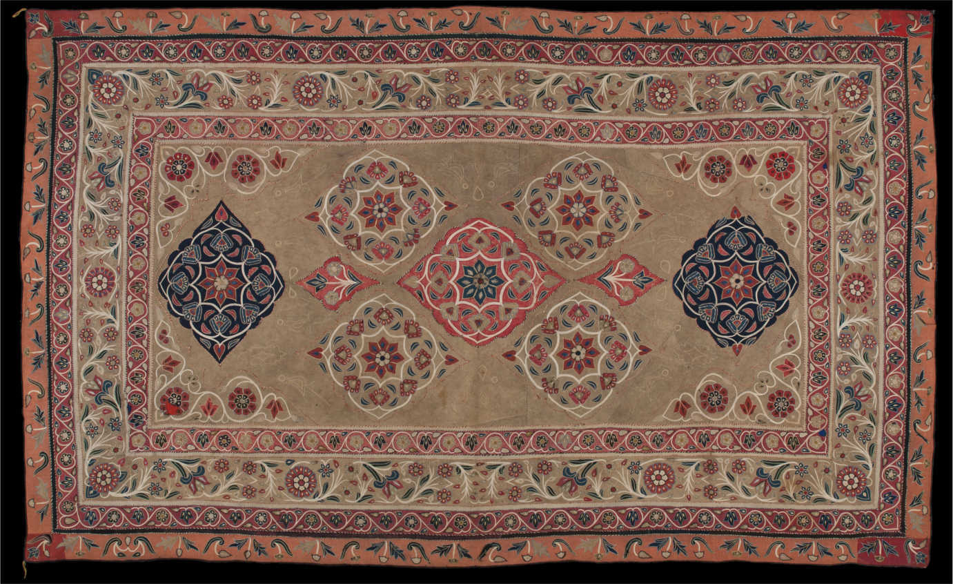 From *The Red That Colored the World*.  Iran Trade Cloth from South Persia, mid-19th century. Wool embroidery and applique. 75 3/16” x 45 11/16” Museum of International Folk Art, Gift of Cyrus Leroy Baldridge. (A.1965.31.40 SW) Photo by Blair Clark. Image courtesy of the  Museum of International Folk Art.