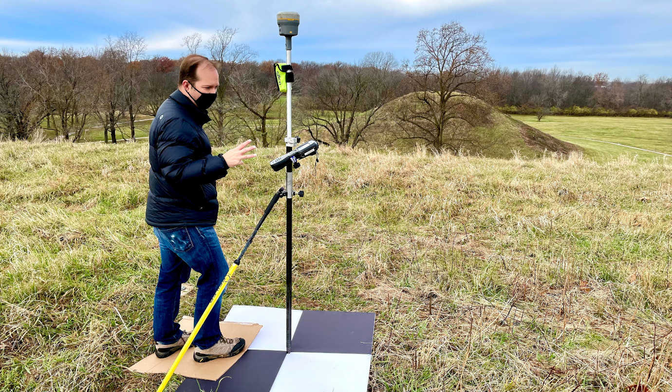 Staff checking coordinates for the AR application. Image courtesy of the Cahokia Mounds Museum Society.