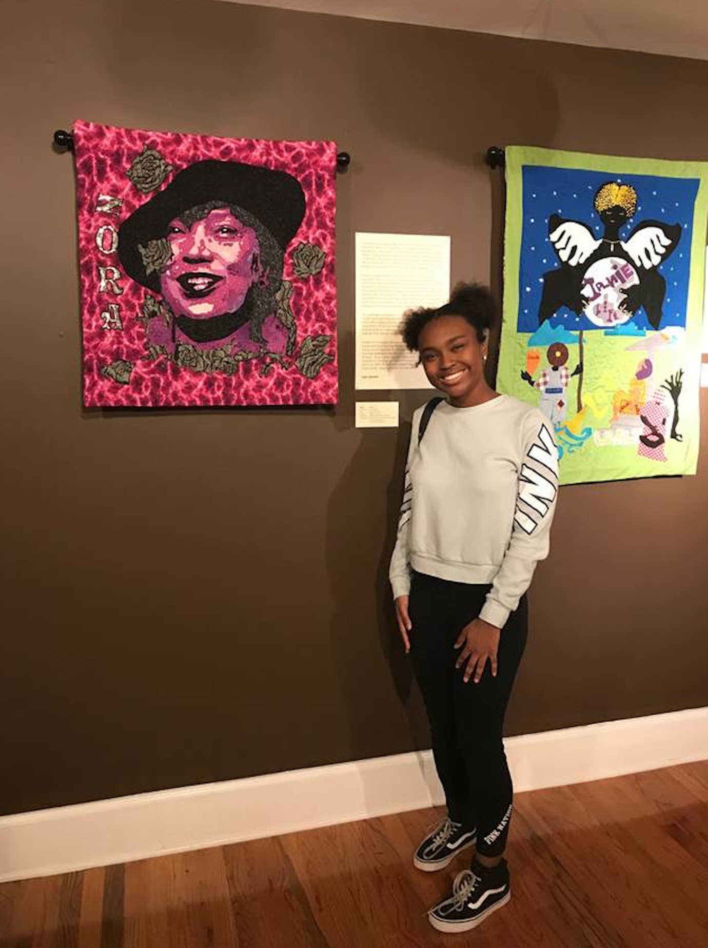 A Tuskegee student visiting “The Soul of Zora: A Literacy Legacy through Quilts” at The Legacy Museum. Image courtesy of Tuskegee University.