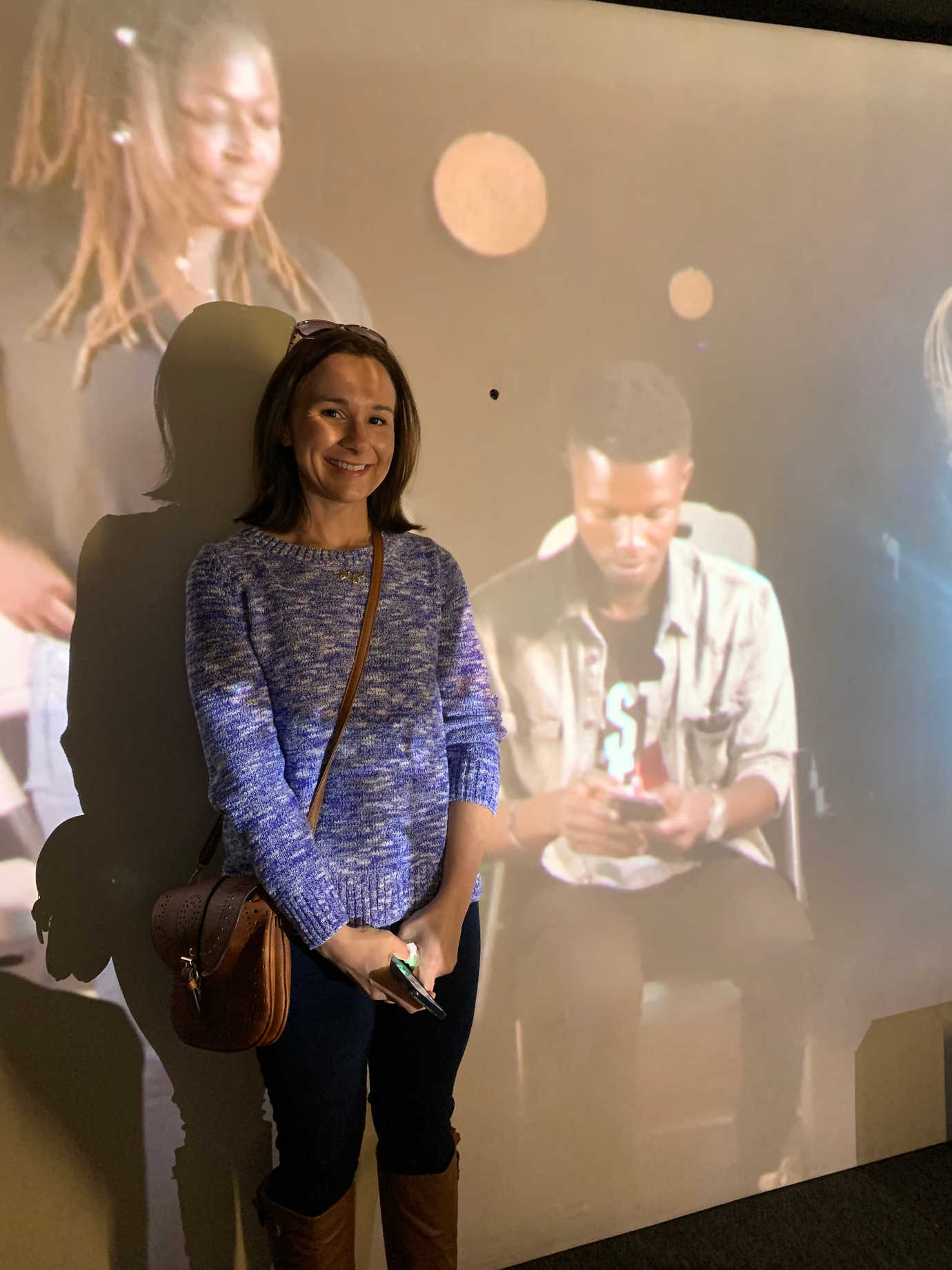 Michelle Wolfe, East Hardy High School English teacher and portal volunteer, listening to original poetry from Lagos, Nigeria. Image courtesy of Wendy Zolla Treadway.