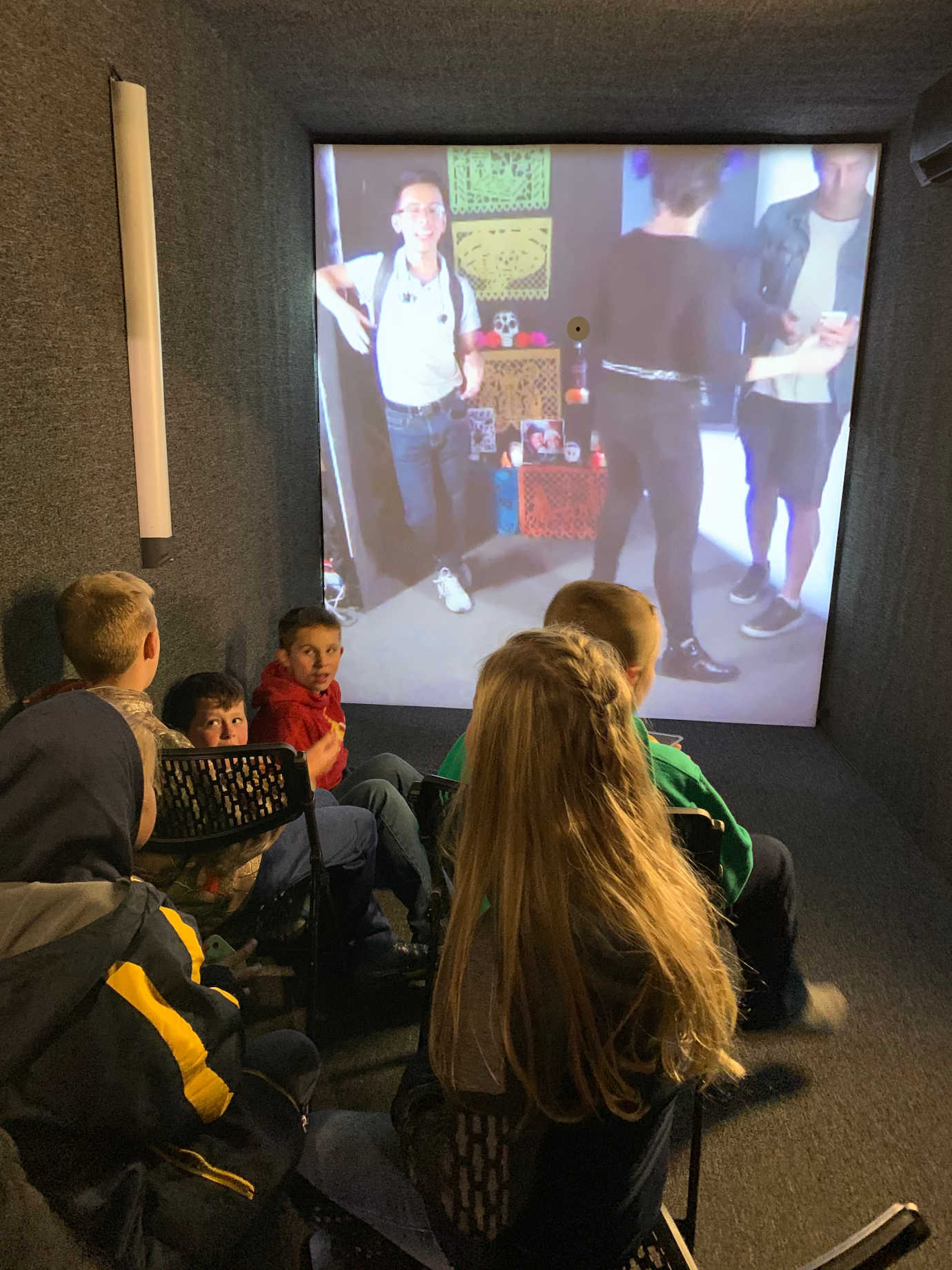 During a high school football game halftime, attendees stepped into the portal to connect to a Day of the dead celebration in Mexico City. Image courtesy of Wendy Zolla Treadway.