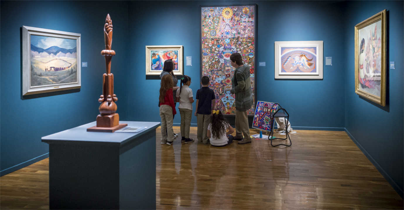 A family explores a gallery at the Gilcrease Museum. Image courtesy of the Gilcrease Museum.
