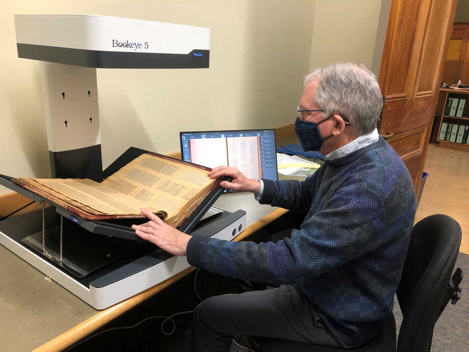 Vermont Historical Society Librarian Paul Carnahan using an overhead scanner purchased with NEH funding. Image courtesy of the Vermont Historical Society.