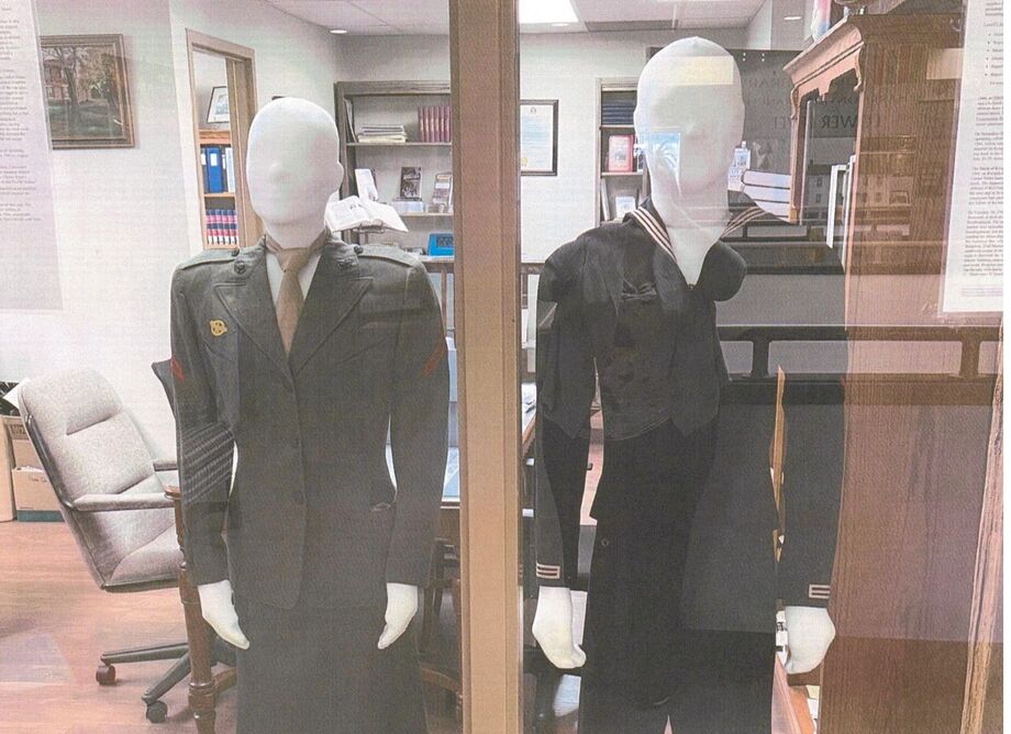 Two of the historical military uniforms in CCHS's collection. Image courtesy Cass County Historical Society.