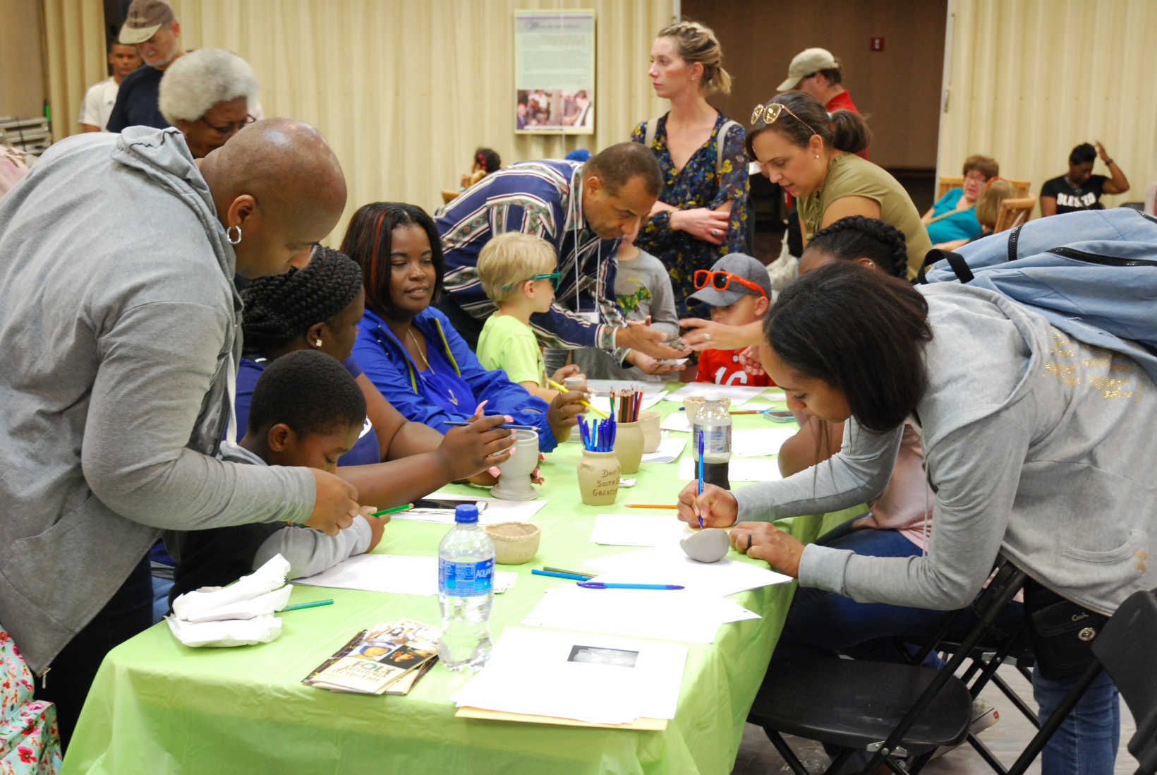 A 2019 pottery workshop hosted by FOLKFabulous introduced fairgoers to David Drake, the nineteenth-century enslaved potter from Edgefield, South Carolina, who sometimes signed, dated, and incised rhymed couplets on the pots he turned. Image courtesy of the McKissick Museum.