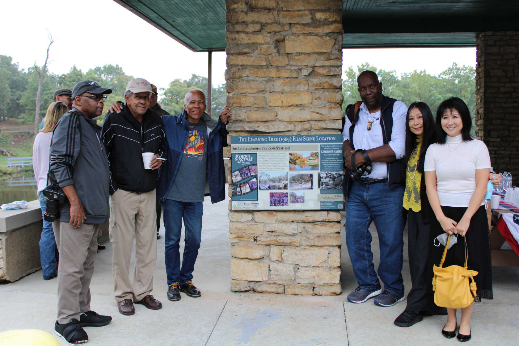 *The Learning Tree* Film Scene and Sign Trail was unveiled at a ribbon cutting ceremony during Fort Scott's annual Gordon Parks Celebration. In this image, special guests gather around an interpretive sign, from left to right: Duane 