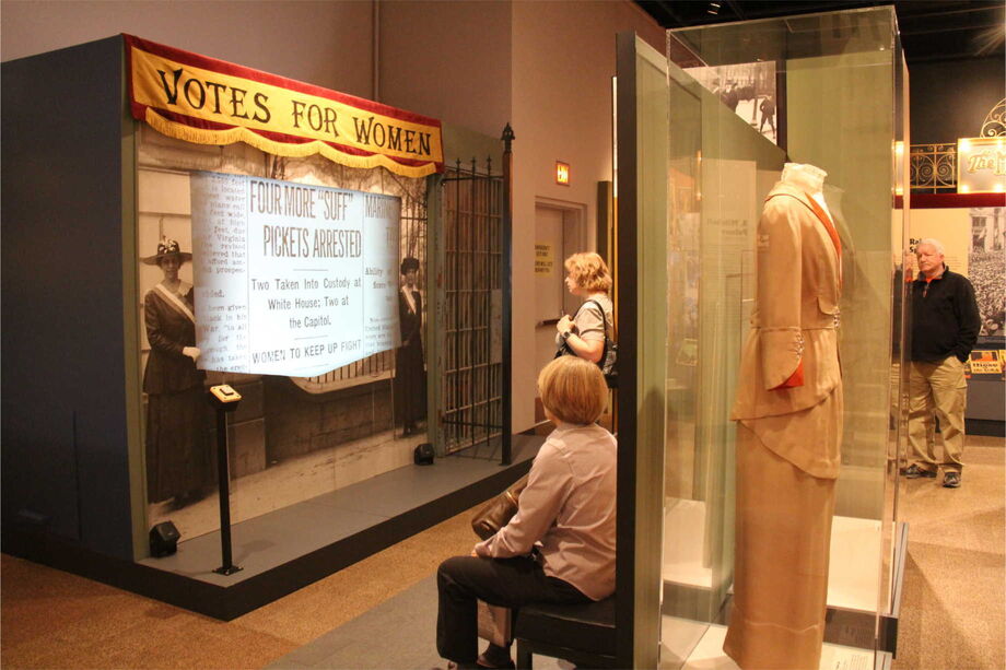 Visitors engage with an exhibit that explores women's suffrage in the United States during World War I.  *World War I America* was funded with an NEH grant. Image courtesy of the Minnesota Historical Society.