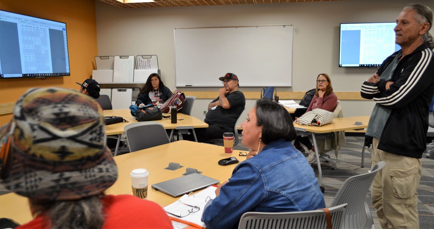 Tribal members study Achumawi at NILI 2019. Photo credit: Bruce Nevin.