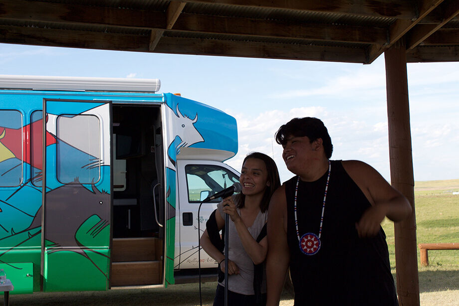 Poets Oriana and Lane at an Open Mic event in June 2017. Image courtesy of Dances With Words.