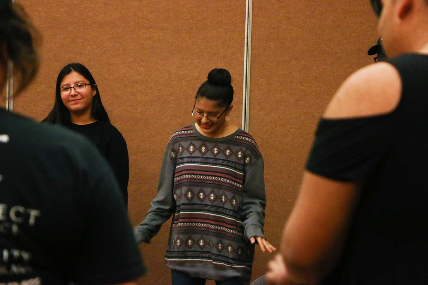 Youth describe the workshops as “a safe space” that feels familial, a place where they can address their personal and community struggles. Students participate in a Dances With Words poets' circle. Image courtesy of Dances With Words.