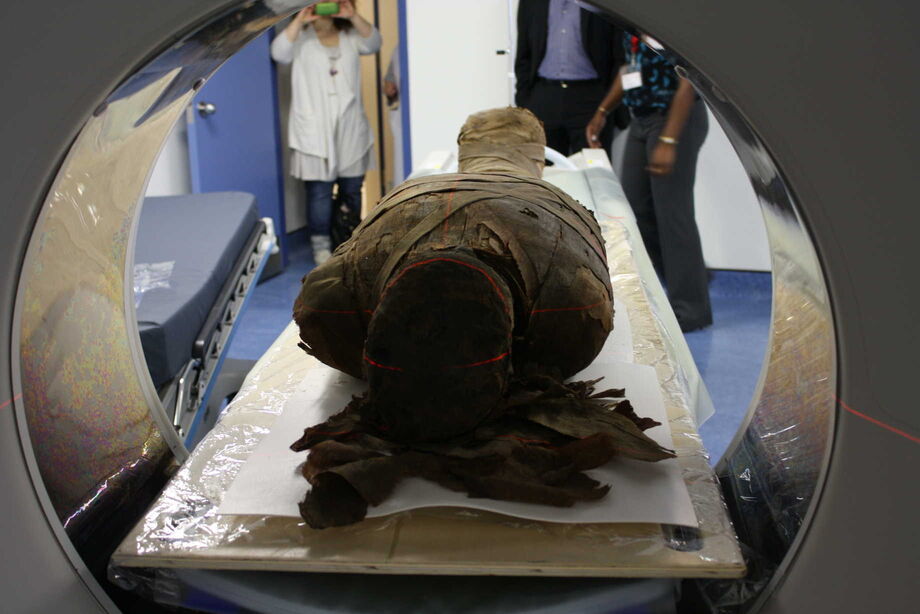 A mummy from the Redpath Museum in Montreal in a CT scanner. With grants from the NEH and Canada’s Social Sciences and Humanities Research Council, researchers at St. Luke’s Mid-America Heart Institute and the University of Western Ontario teamed up to build the IMPACT Radiological Database, an online clearinghouse of medical images taken from mummified human remains. Image courtesy Andrew Nelson, University of Western Ontario.