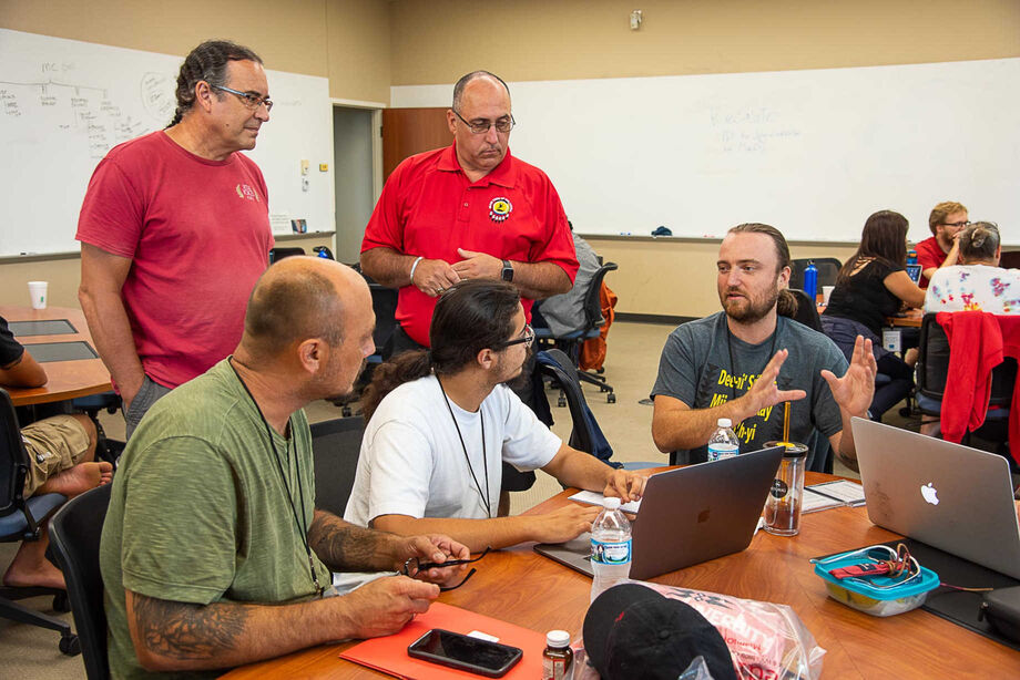 Co-Director Daryl Baldwin, Miami Tribe of Oklahoma Chief Douglas Lankford and Staff Trainer Jerome Viles working with Nisenan participants at National Breath of Life Archival Institute Module 2 at Miami University, Oxford, Ohio. 2019. Photo Credit: Karen L. Baldwin