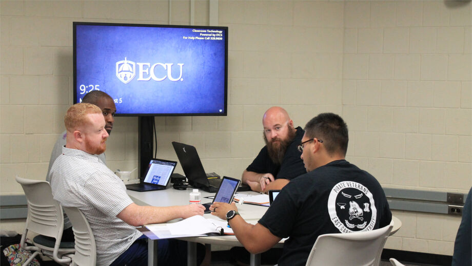 Participants in East Carolina University's summer bootcamp for veterans read and discussed texts about war and homecoming.  Image courtesy of East Carolina University.