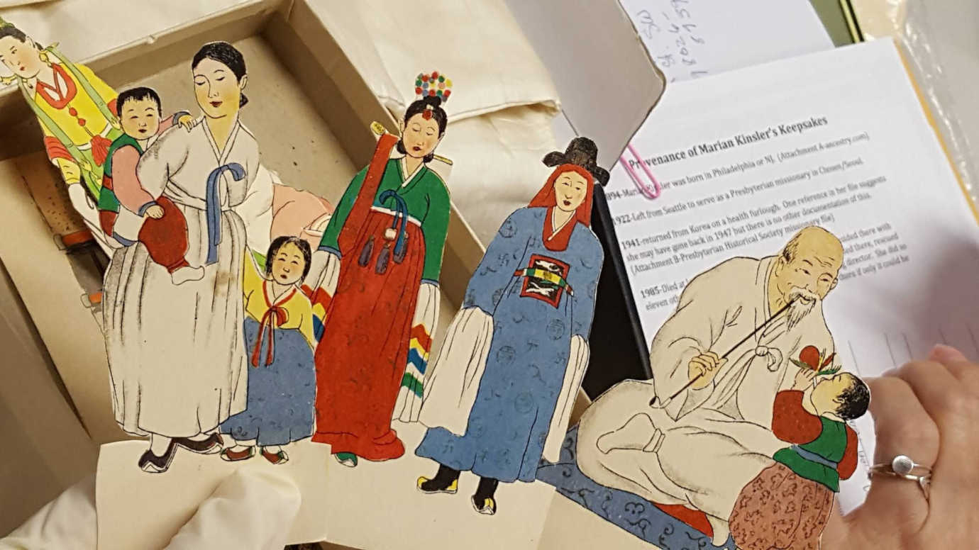 Fragile antique paper doll brought in by a participant. Project facilitators carefully digitized the item and provided instructions on how to best preserve and protect it. Photo courtesy of Korean American Historical Society.