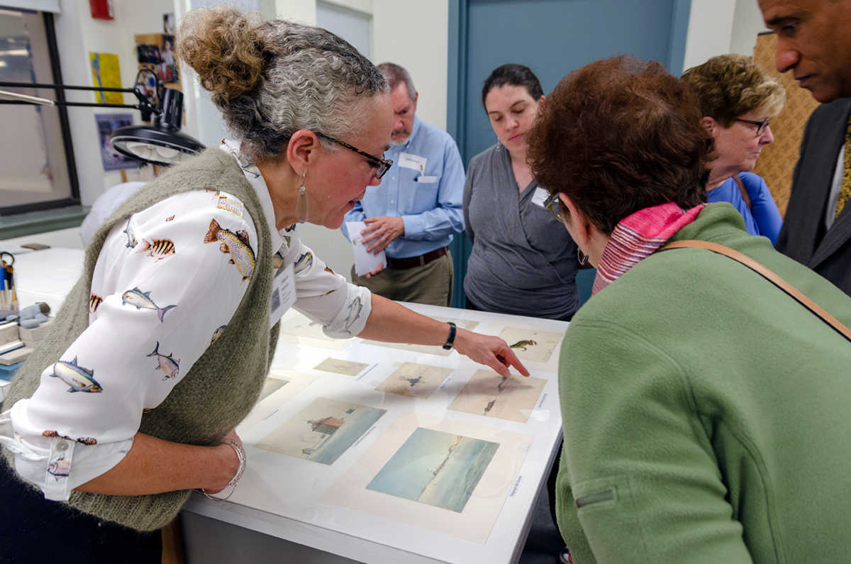 Through CCAHA's workshops, staff from cultural institutions learn to care for items in their collections, including historical images. Image courtesy of CCAHA.