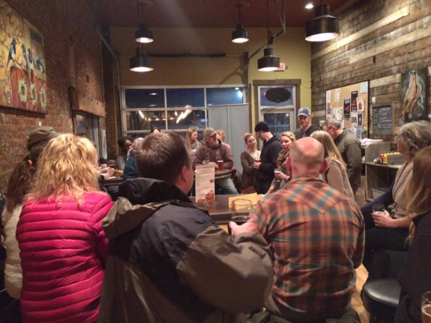 Residents of Livingston discuss the local economy and housing issues at Katabatic Brewing as part of the Livingston Livelihoods Community Conversation Series. Photo courtesy of Humanities Montana.