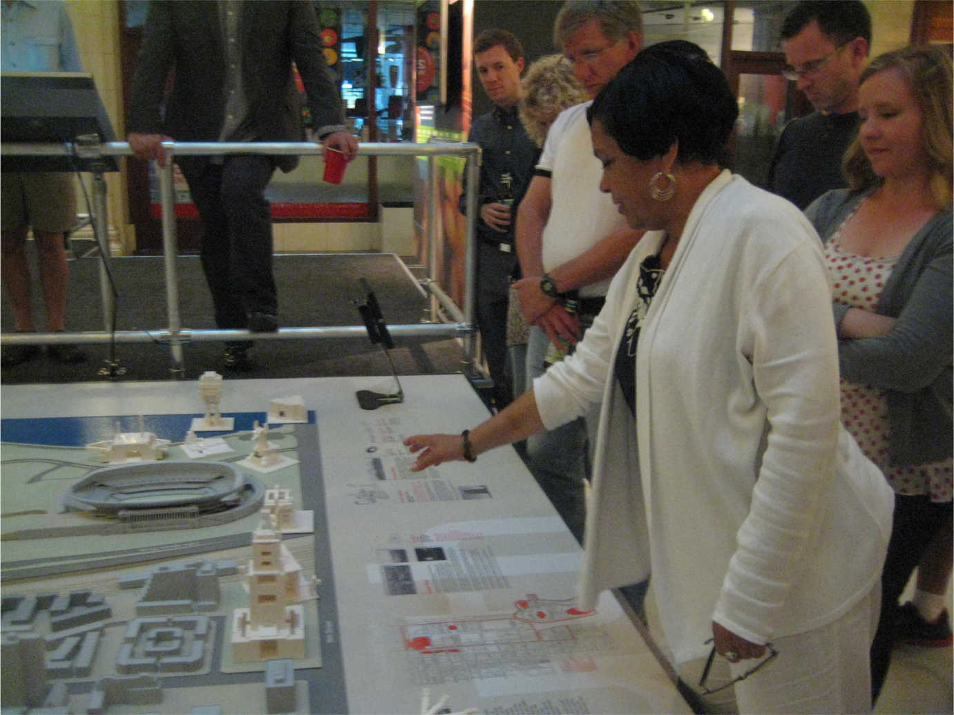 At a reception, teachers examine a three-dimensional map of Chicago. Image courtesy of the Chicago Architecture Foundation.