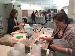 Participants in a paper conservation workshop experiment with chelating agents. NEH funding makes continuing education opportunities like this one available to conservation professionals across the country, ensuring that they are equipped with best practices and up-to-date information when preserving heritage objects. Image courtesy of FAIC.
