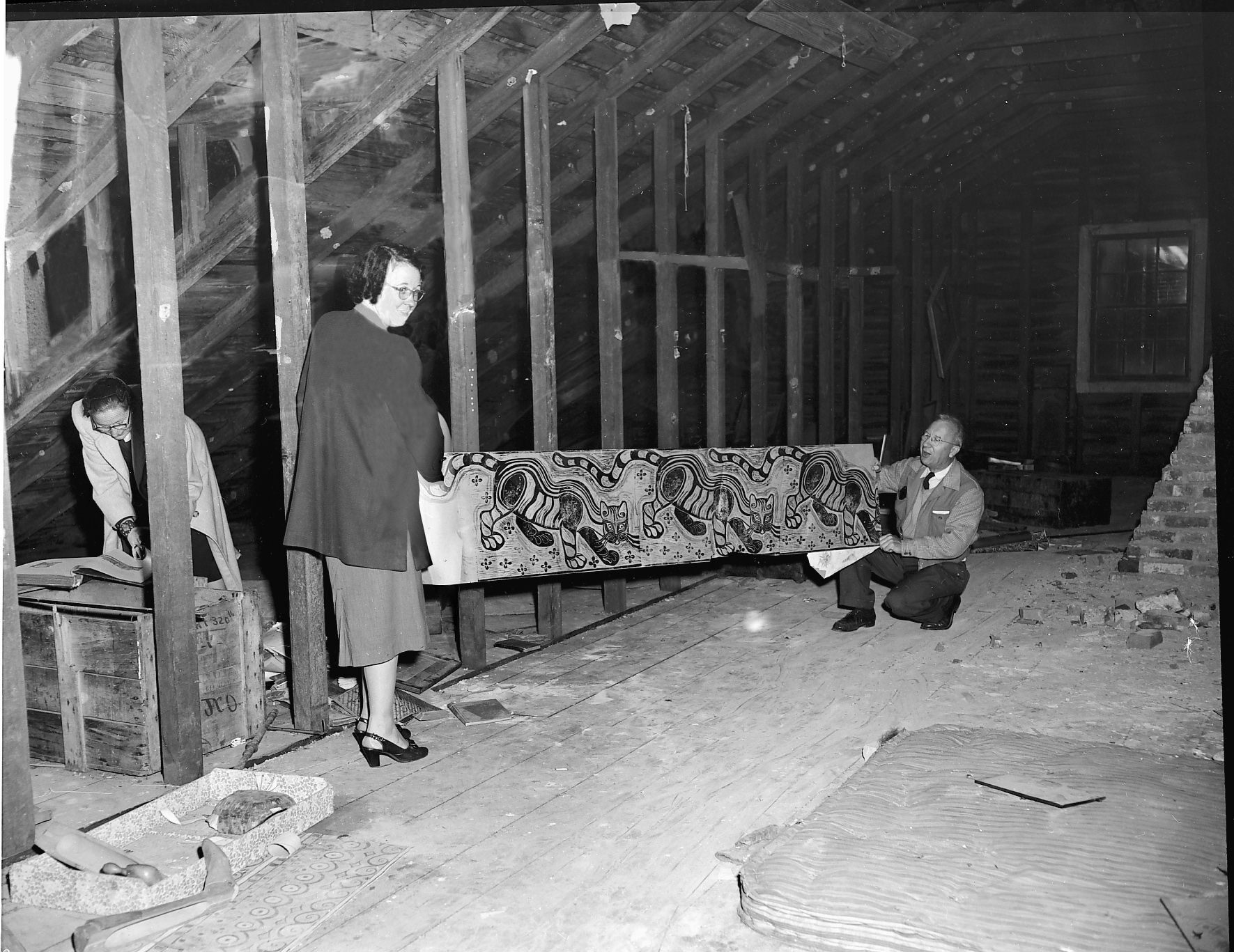 Ray Thompson and Ruthe M. Carr hold a Walter Anderson print in the unfinshed attic at Oldfields House, a National Historic Site in Mississippi. Originally published in Down South Magazine, this photograph was one of the many saved with the assistance of NEH grants. Image courtesy of Mississippi Gulf Coast Community College C.C. “Tex” Hamill Down South Magazine Collection.