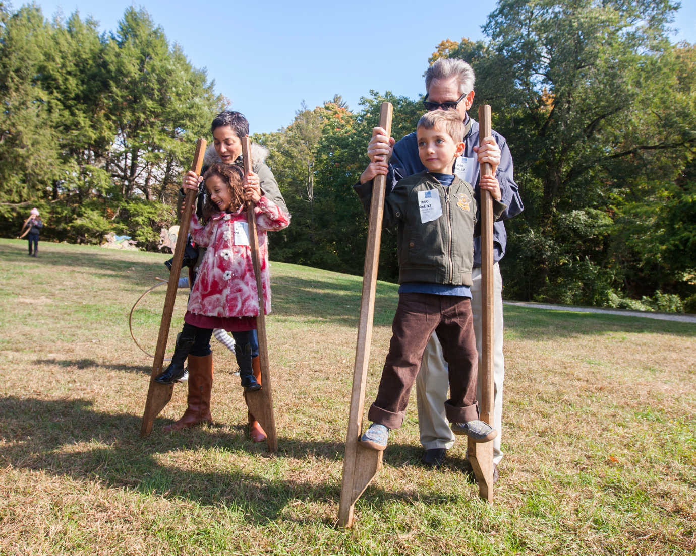 At Historic Hudson Valley, guests can try out eighteenth-century forms of entertainment, such as the stilts and hoops seen here. Image courtesy of Historic Hudson Valley.