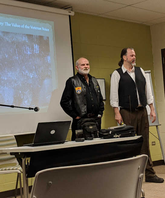 Project Co-Director Todd Culp introduces DePaul University Professor and Vietnam War veteran James Brask’s public talk entitled “The Value of the Veteran Voice.” Photo courtesy of Mark Waters.