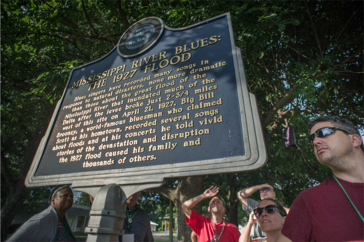 Teachers view a flood marker on the Mississippi River Blues trail. Image courtesy of the Delta Center for Culture and Learning at Delta State University.