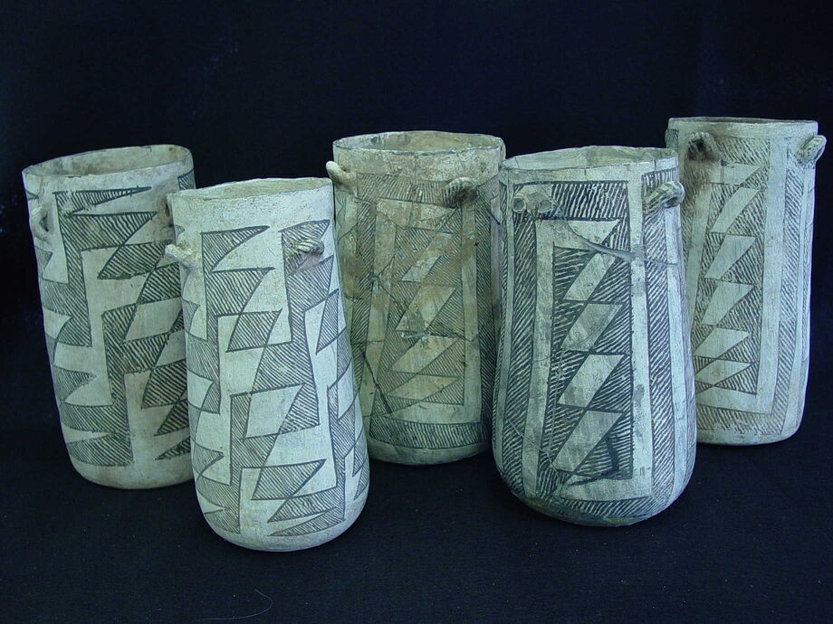 Five cylinder jars from Pueblo Bonito.  Catalogue Nos. H3414, H3229, H3406, H3415, and H4153.  Courtesy Patricia Crown, from the collections of the American Museum of Natural History, photograph by Marianne Tyndall.