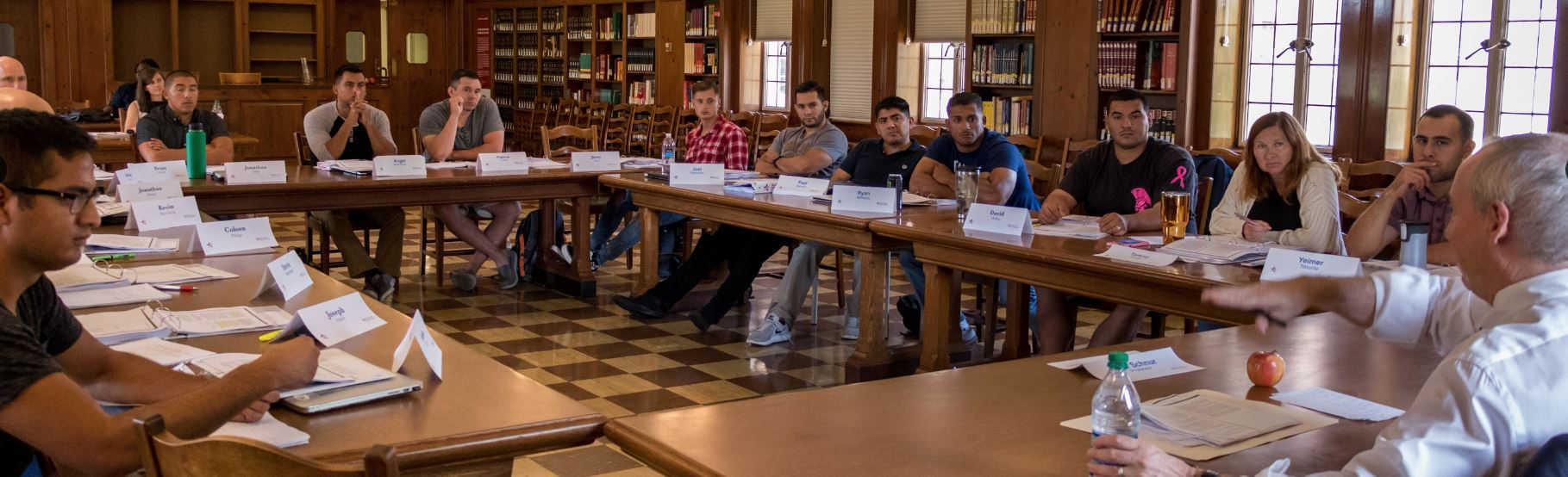 The Warrior-Scholar project gives veterans the opportunity to study texts and ideas that are foundational to democracy.  Here, veterans discuss the Declaration of Independence. Image courtesy of the Warrior-Scholar Project.